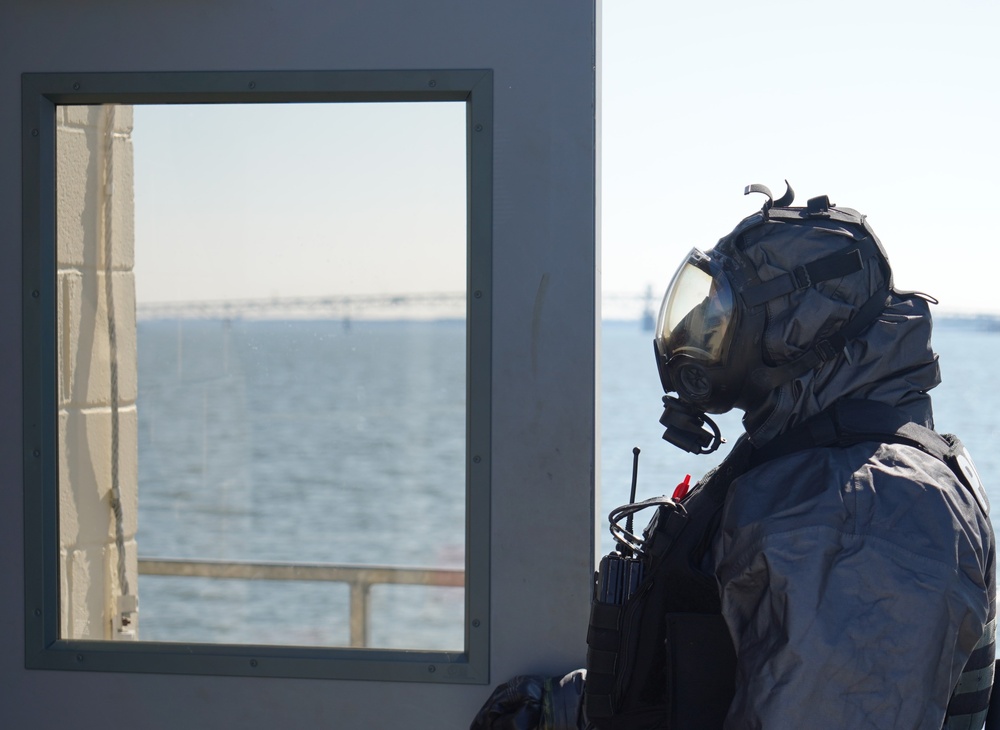 NWS Yorktown Sailor dons personal protective equipment during exercise Citadel Shield-Solid Curtain 2024