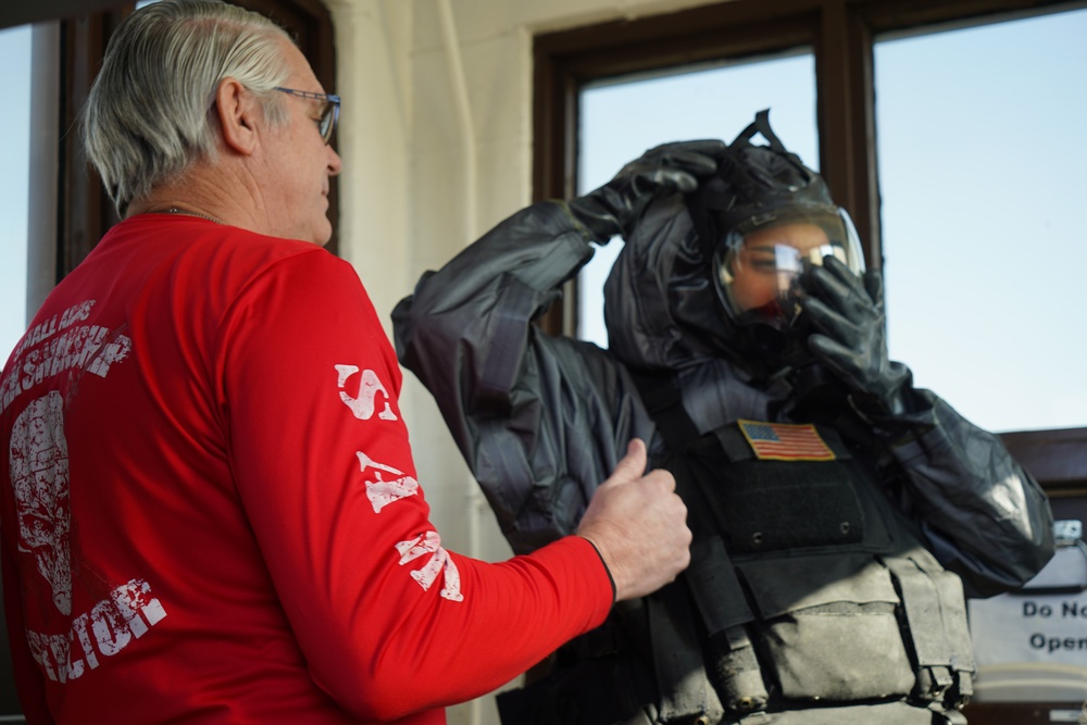 NWS Yorktown Sailor dons personal protective equipment during exercise Citadel Shield-Solid Curtain 2024