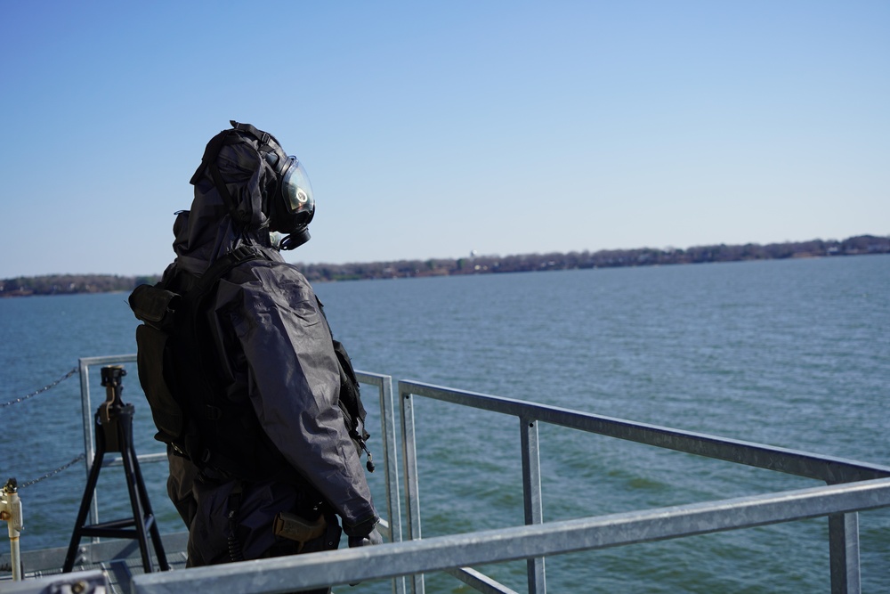 NWS Yorktown Sailor dons personal protective equipment during exercise Citadel Shield-Solid Curtain 2024