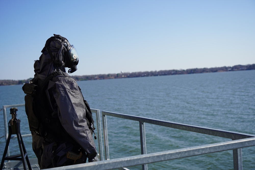 NWS Yorktown Sailor dons personal protective equipment during exercise Citadel Shield-Solid Curtain 2024