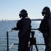 NWS Sailors keep watch during Exercise Citadel Shield-Solid Curtain 2024 while wearing chemical suits