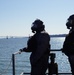 NWS Sailors keep watch during Exercise Citadel Shield-Solid Curtain 2024 while wearing chemical suits