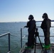 NWS Sailors keep watch during Exercise Citadel Shield-Solid Curtain 2024 while wearing chemical suits