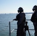 NWS Sailors keep watch during Exercise Citadel Shield-Solid Curtain 2024 while wearing chemical suits