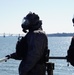 NWS Sailors keep watch during Exercise Citadel Shield-Solid Curtain 2024 while wearing chemical suits