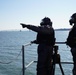 NWS Sailors keep watch during Exercise Citadel Shield-Solid Curtain 2024 while wearing chemical suits