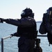 NWS Sailors keep watch during Exercise Citadel Shield-Solid Curtain 2024 while wearing chemical suits