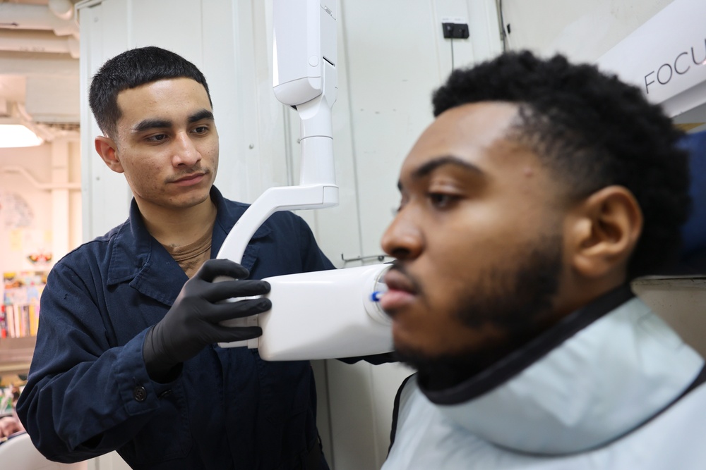 USS BATAAN MEDICAL SAILORS CONDUCT ROUTINE OPERATIONS