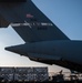 Airmen load cargo on C-17 Globemaster III