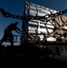 Airmen load cargo on C-17 Globemaster III