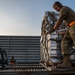 Airmen load cargo on C-17 Globemaster III