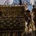 Airmen load cargo on C-17 Globemaster III