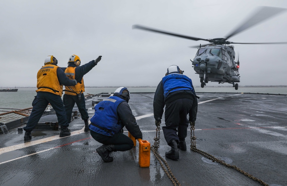 USS Gunston Hall Conducts Vertical Replenishment with a French Navy NH90 Helicopter