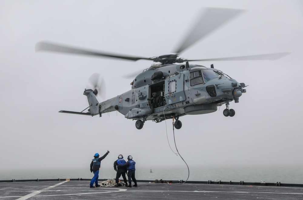 USS Gunston Hall Conducts Vertical Replenishment with a French Navy NH90 Helicopter