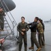 Aircrew members celebrate final flight