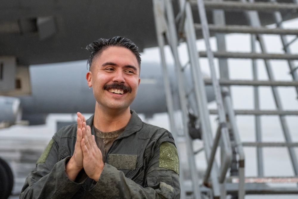 Aircrew members celebrate final flight