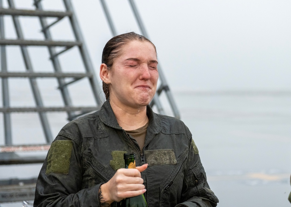 Aircrew members celebrate final flight