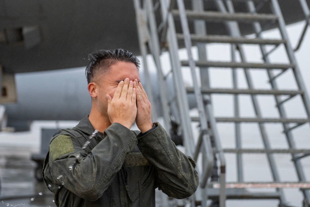 Aircrew members celebrate final flight