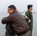 Aircrew members celebrate final flight