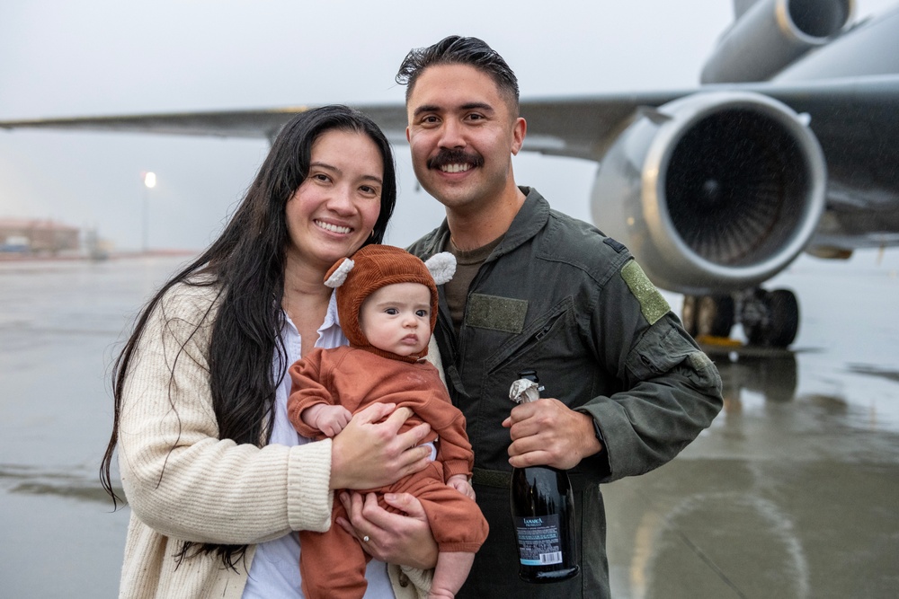 Aircrew members celebrate final flight