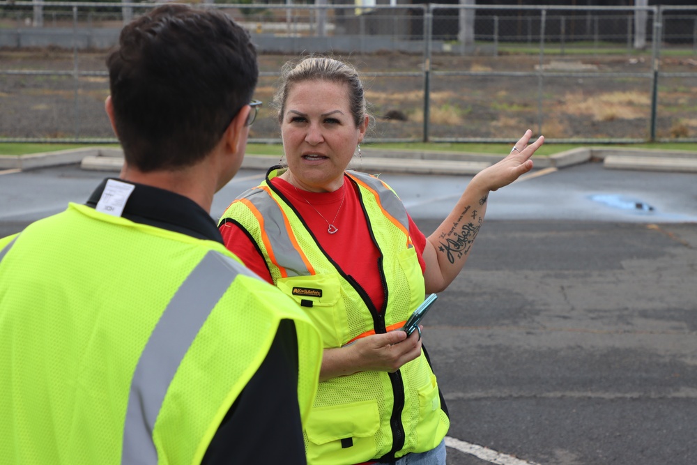 USACE safety officer gives safety briefing to reporter from Se Habla Media