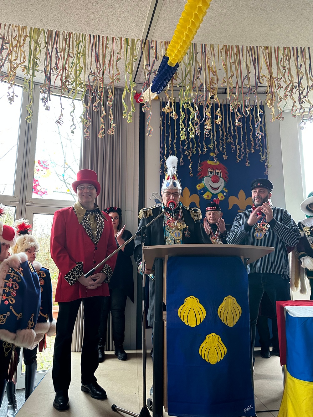 USAG Wiesbaden Garrison Commander Col. David Mayfield receiving the city of Wiesbaden Fasching Medal from Lord Mayor Gert-Uwe Mende