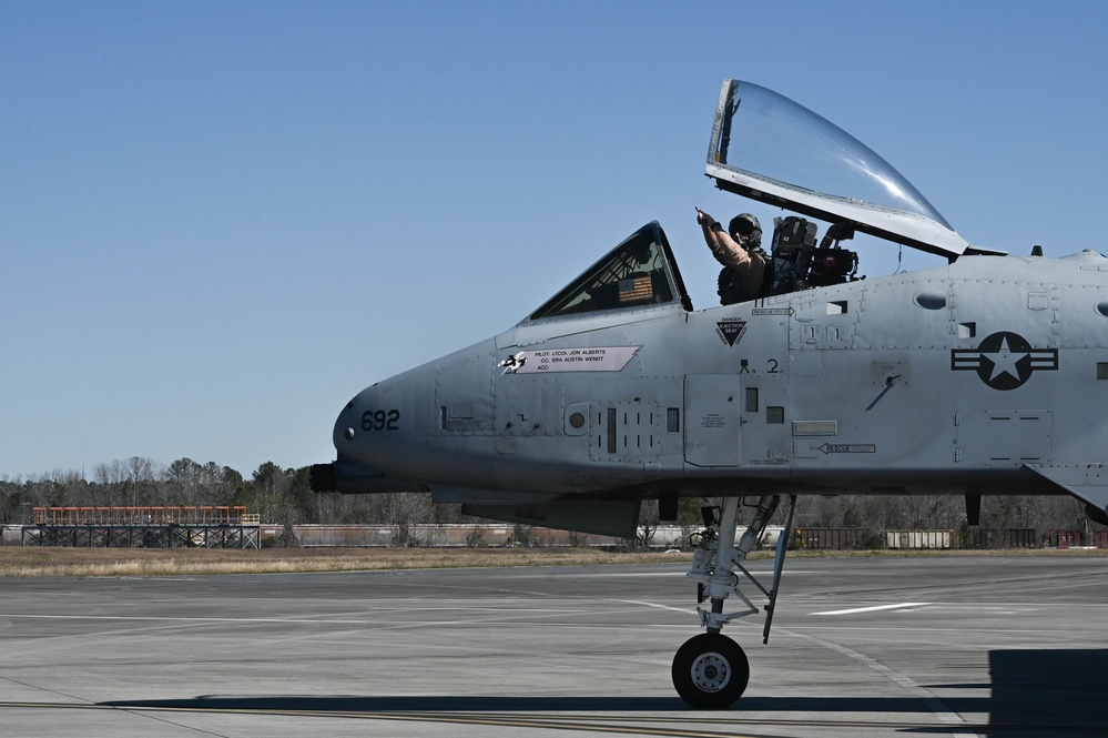 60th AMU crew chief marshals A-10 Thunderbolt II