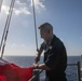 USS Bataan Quartermasters Practice Raising Flags