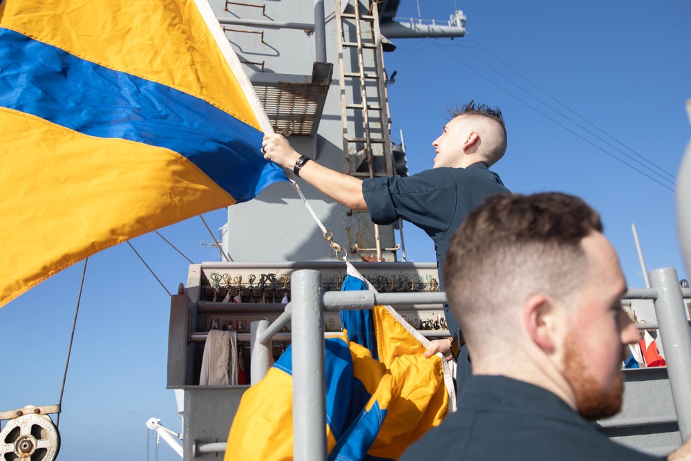 USS Bataan Quartermasters Practice Raising Flags