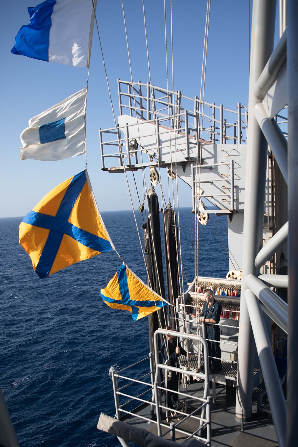 USS Bataan Quartermasters Practice Raising Flags