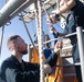 USS Bataan Quartermasters Practice Raising Flags