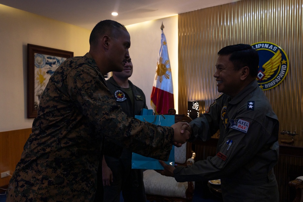 U.S. Marines and personnel from USAID receive recognition from the Acting Vice Commander of the Philippine Air Force