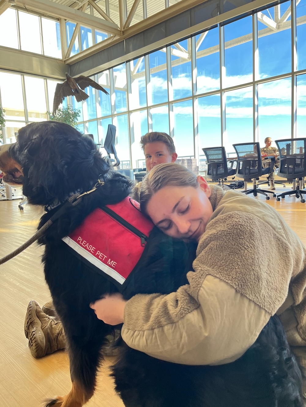Therapy dogs bring smiles; reduce cadet stress