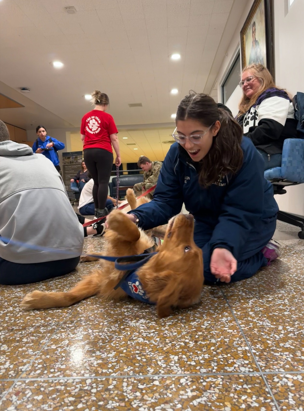 Therapy dogs bring smiles; reduce cadet stress