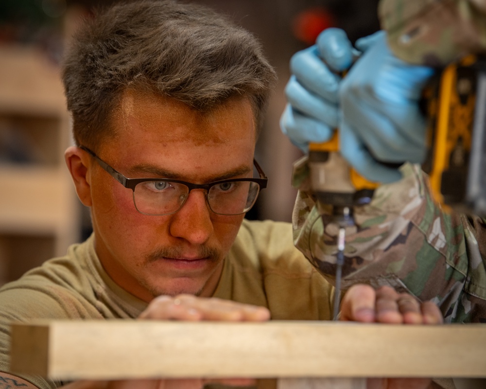 U.S. service members at AB 201 build desks for Agadez schoolchildren