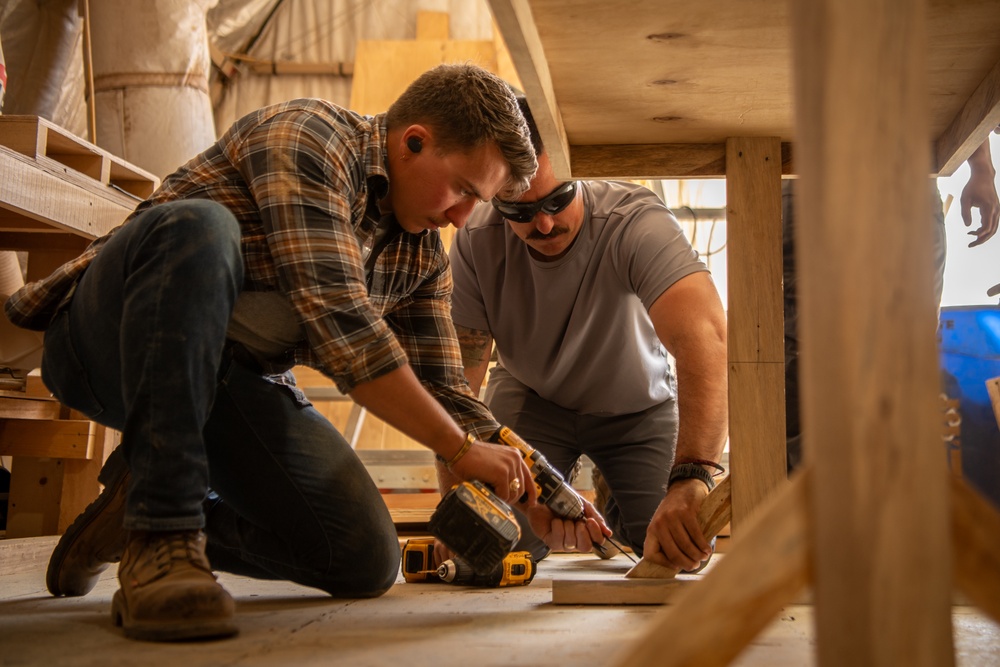 U.S. service members at AB 201 build desks for Agadez schoolchildren