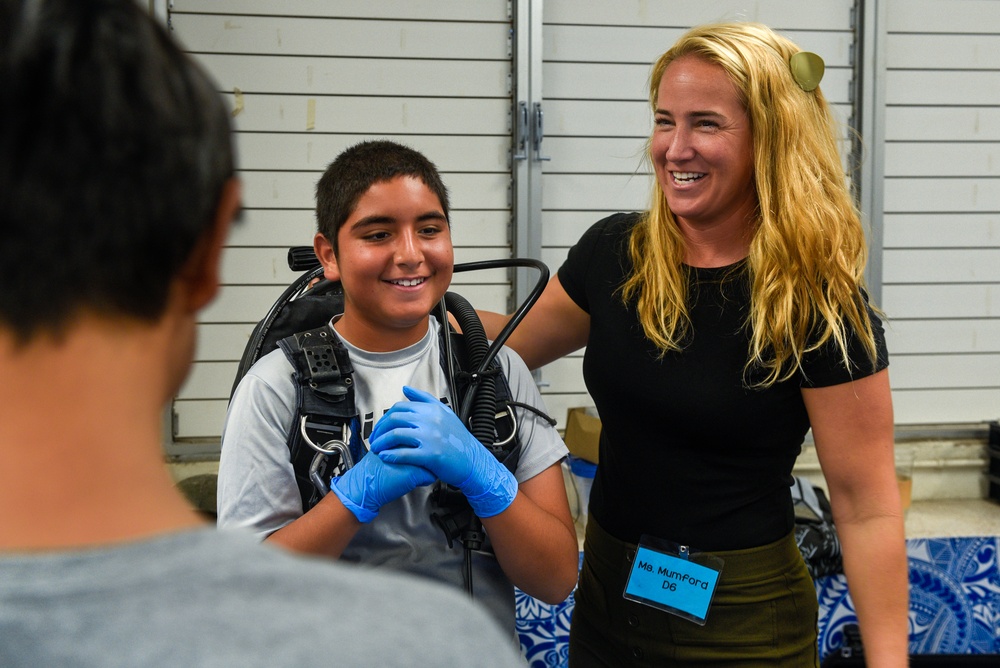 DPAA visits Aliamanu Middle School