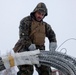 U.S. Marines with 2nd Marine Aircraft Wing set up concertina wire in preparation for Exercise Nordic Response 24