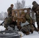 U.S. Marines with 2nd Marine Aircraft Wing set up concertina wire in preparation for Exercise Nordic Response 24