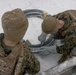 U.S. Marines with 2nd Marine Aircraft Wing set up concertina wire in preparation for Exercise Nordic Response 24