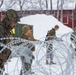 U.S. Marines with 2nd Marine Aircraft Wing set up concertina wire in preparation for Exercise Nordic Response 24