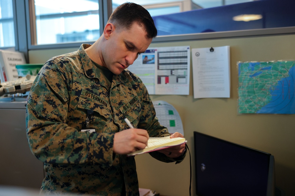 Gunnery Sgt. Joshua Ostermann does his job around Marine Corps Recruiting Command