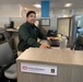 Andres Restrepo working at his desk at TAM headquarters.