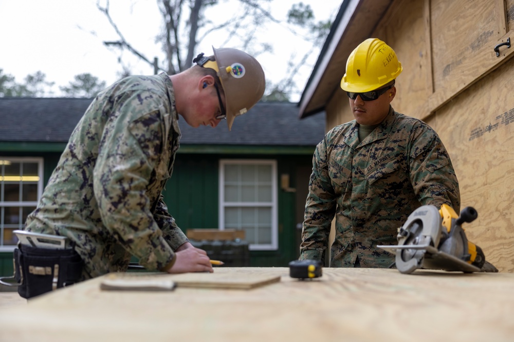 U.S. Marines and U.S. Navy Seabees Construct Shelters During Winter Pioneer 2024
