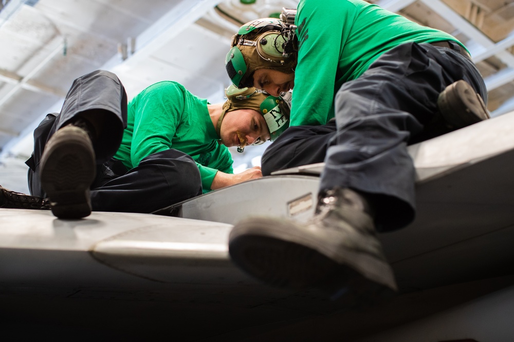 VFA-103 Sailors maintaining aircraft