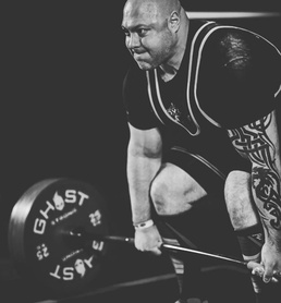 Heavy lifting: ACC-RI employee balances fitness, military and civilian service