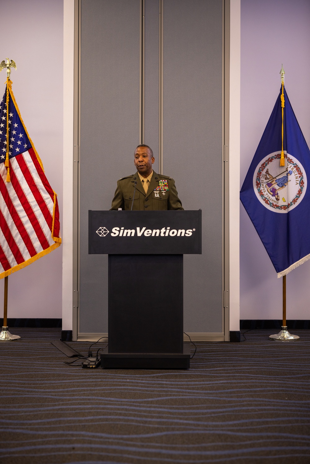 Col. Michael L. Brooks, Marine Corps Base Quantico commander, speaks at the Fredericksburg Regional Chamber of Commerce