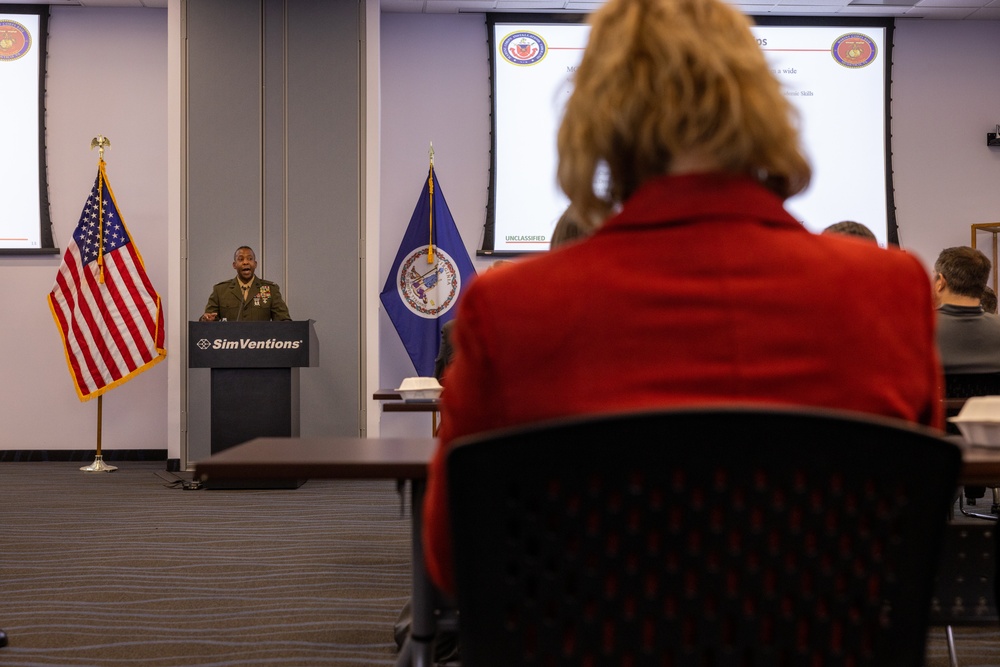 Col. Michael L. Brooks, Marine Corps Base Quantico commander, speaks at the Fredericksburg Regional Chamber of Commerce