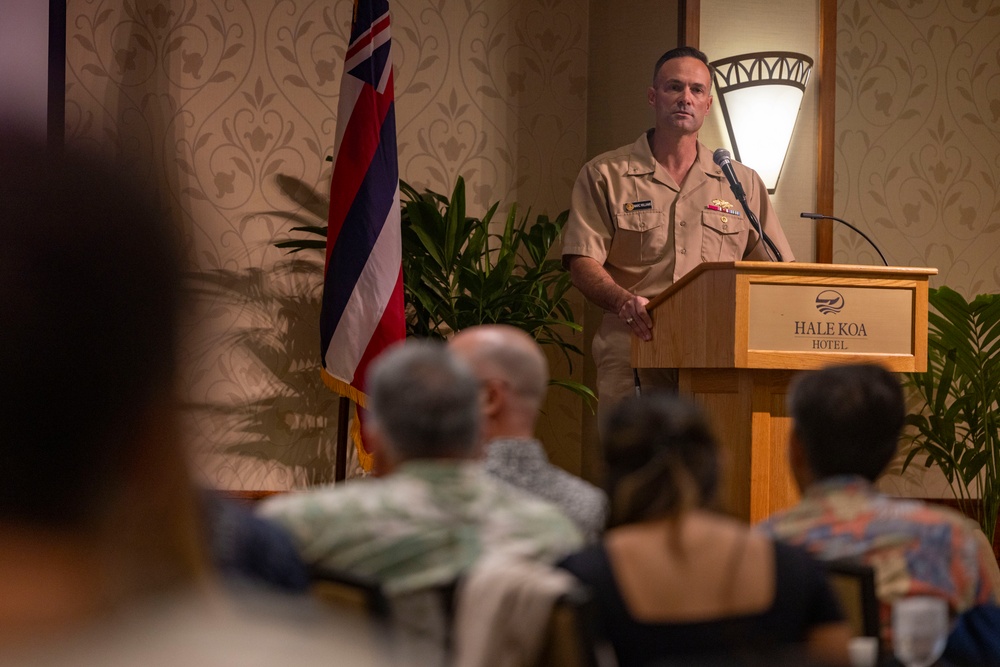 Rear Adm. Marc Williams, deputy commander, Navy Closure Task Force –Red Hill speaks at the Society of Military Engineers Luncheon