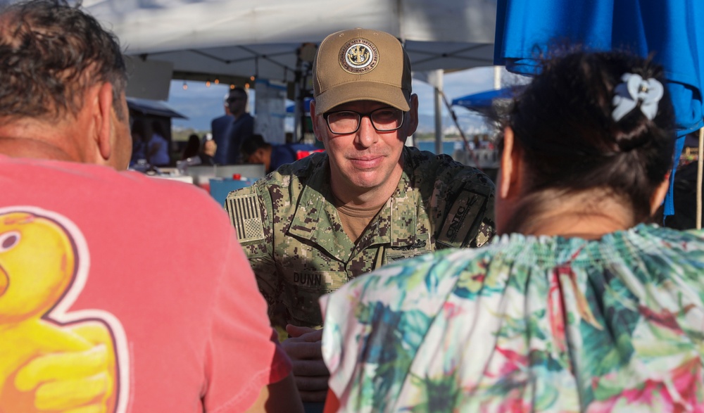 Force Master Chief Jason Dunn, the senior enlisted leader for Commander, Navy Installations Command, speaks with Hawaii residents about the Navy’s Drinking Water Long-Term Monitoring program